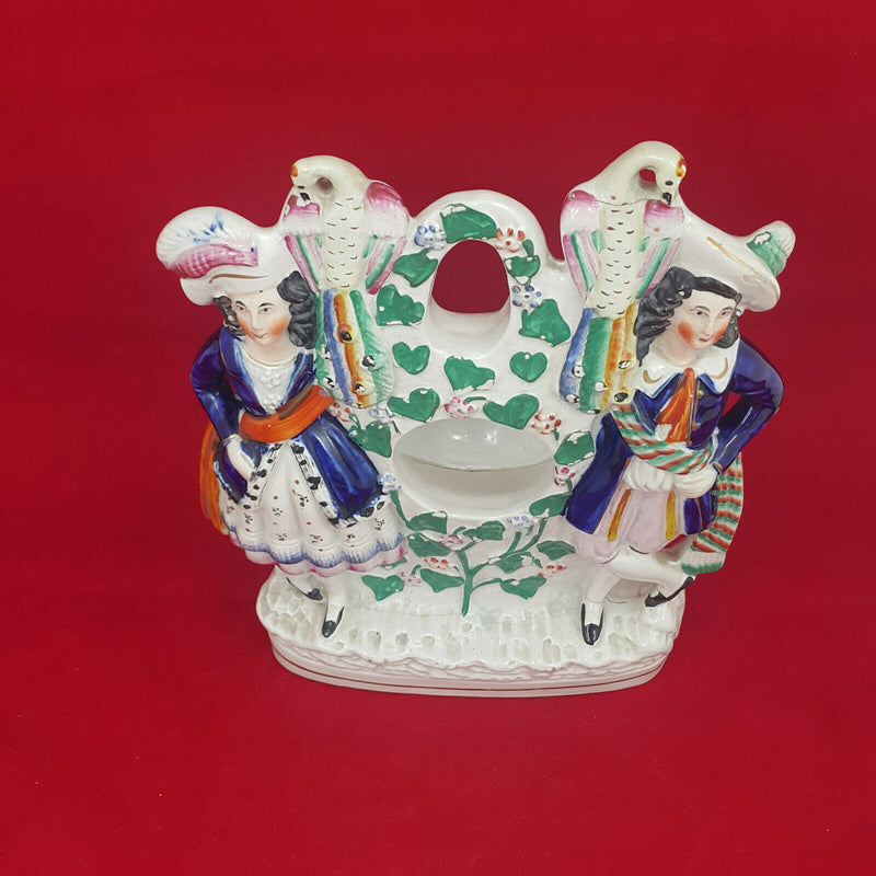 Staffordshire Watch Holder - Couple Standing in Vineyard with Two Peacocks Above