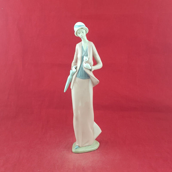 Lladro Nao Figurine 1232 Autumn Stroll Lady in Pink Dress (Chipped) - 7595 L/N