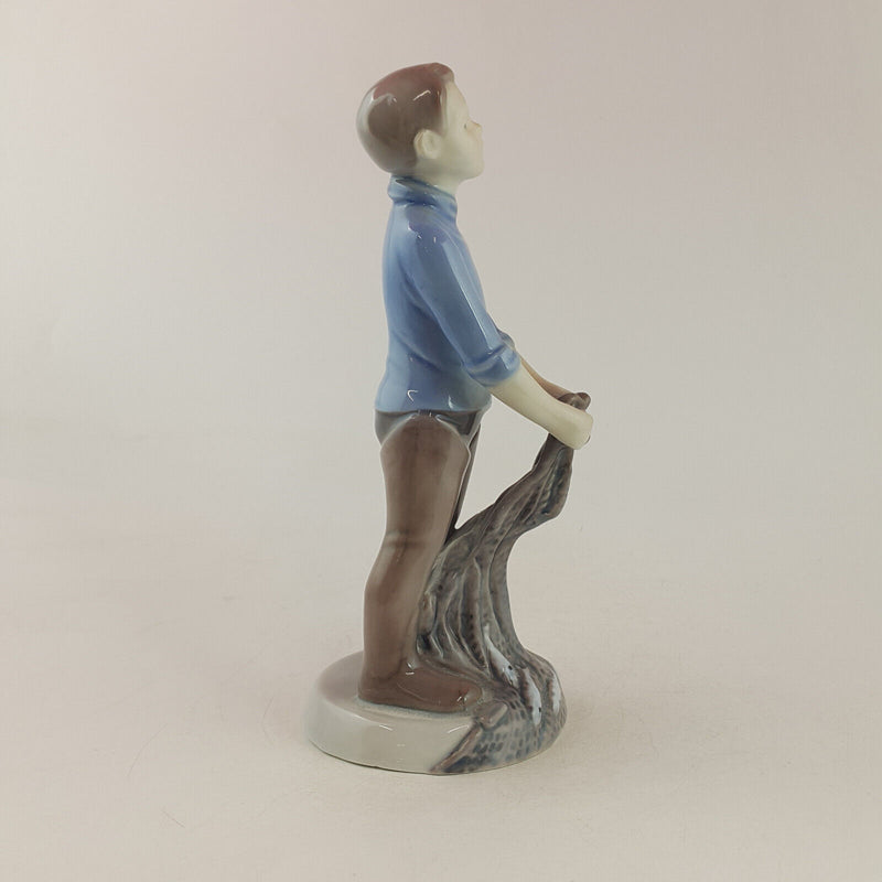 Royal Copenhagen B&G Figurine - Boy with Fish & Net 2338 - RCH 2299