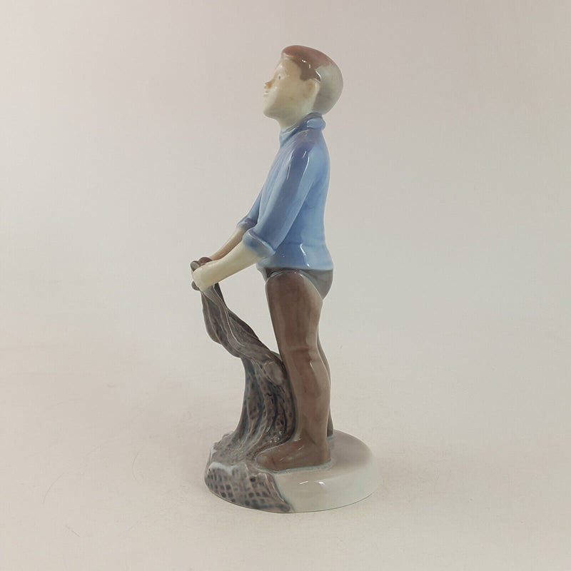 Royal Copenhagen B&G Figurine - Boy with Fish & Net 2338 - RCH 2299