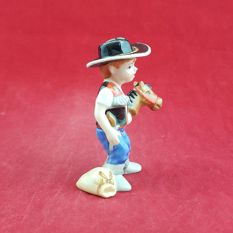 Royal Copenhagen Miniature Child Figure - Boy On Hobby Horse 011 - RCH 2047