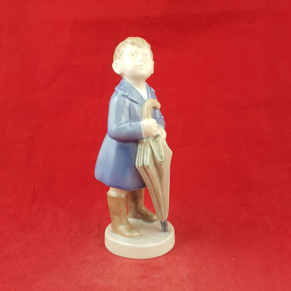 Royal Copenhagen Monthly Figurine 4526 Boy with Umbrella April - 7537 RCH