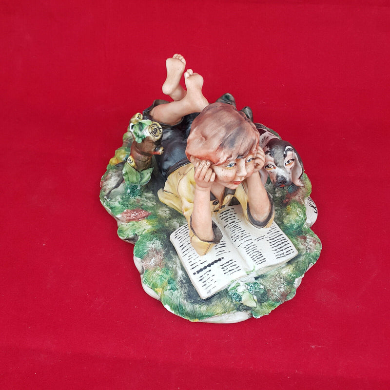 Capodimonte Figurine Milio - Boy Reading Book with Dog (small chip)