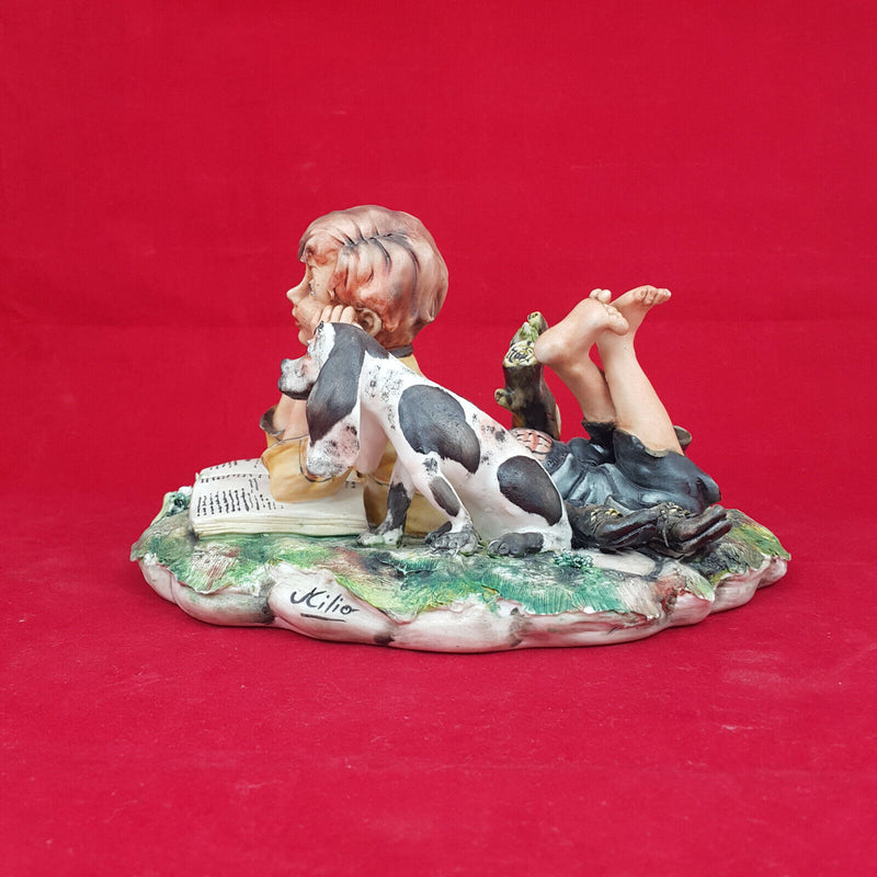 Capodimonte Figurine Milio - Boy Reading Book with Dog (small chip)