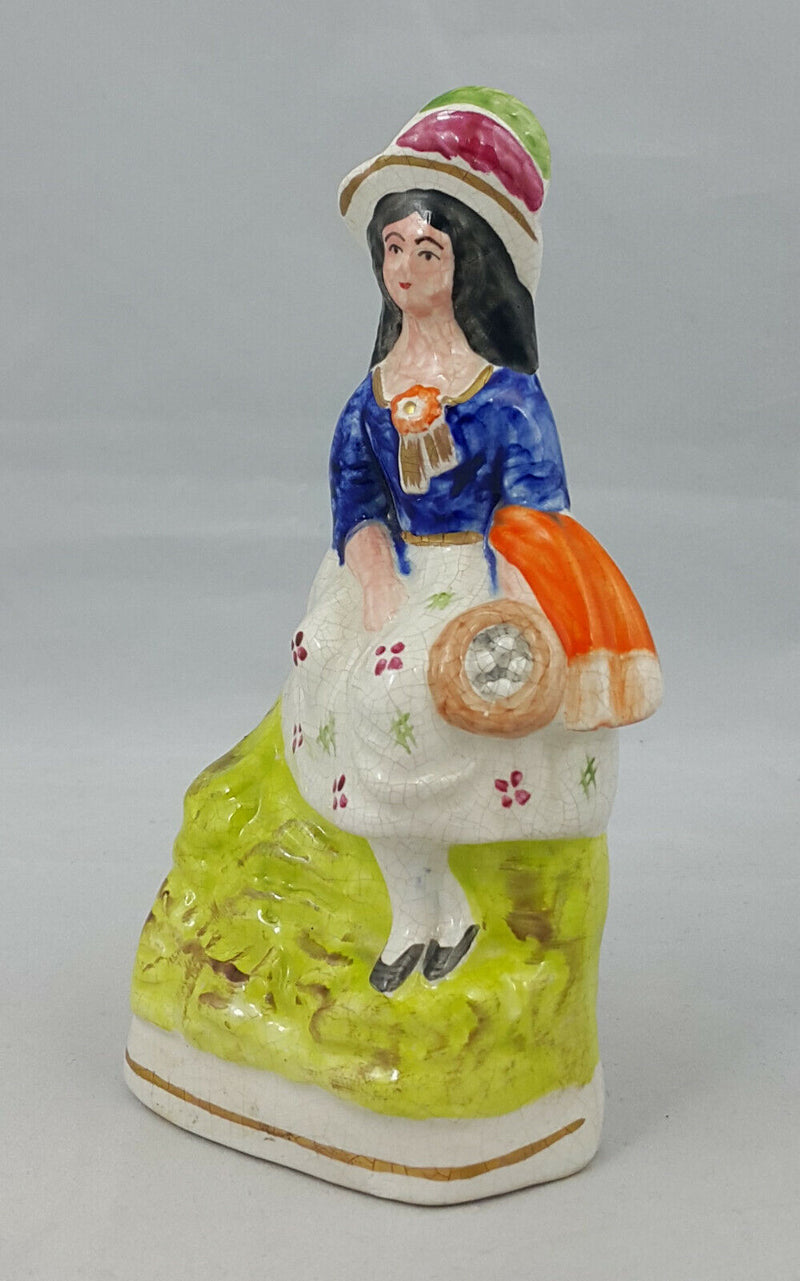 Staffordshire Figurine Lady in a Sitting Pose – Paint Chip