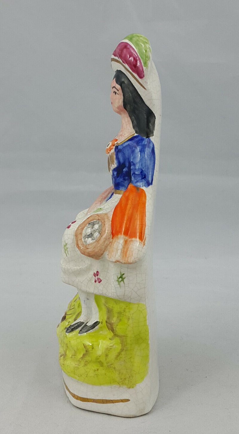 Staffordshire Figurine Lady in a Sitting Pose – Paint Chip