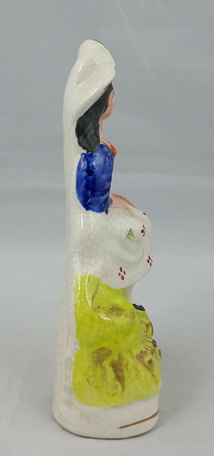 Staffordshire Figurine Lady in a Sitting Pose – Paint Chip