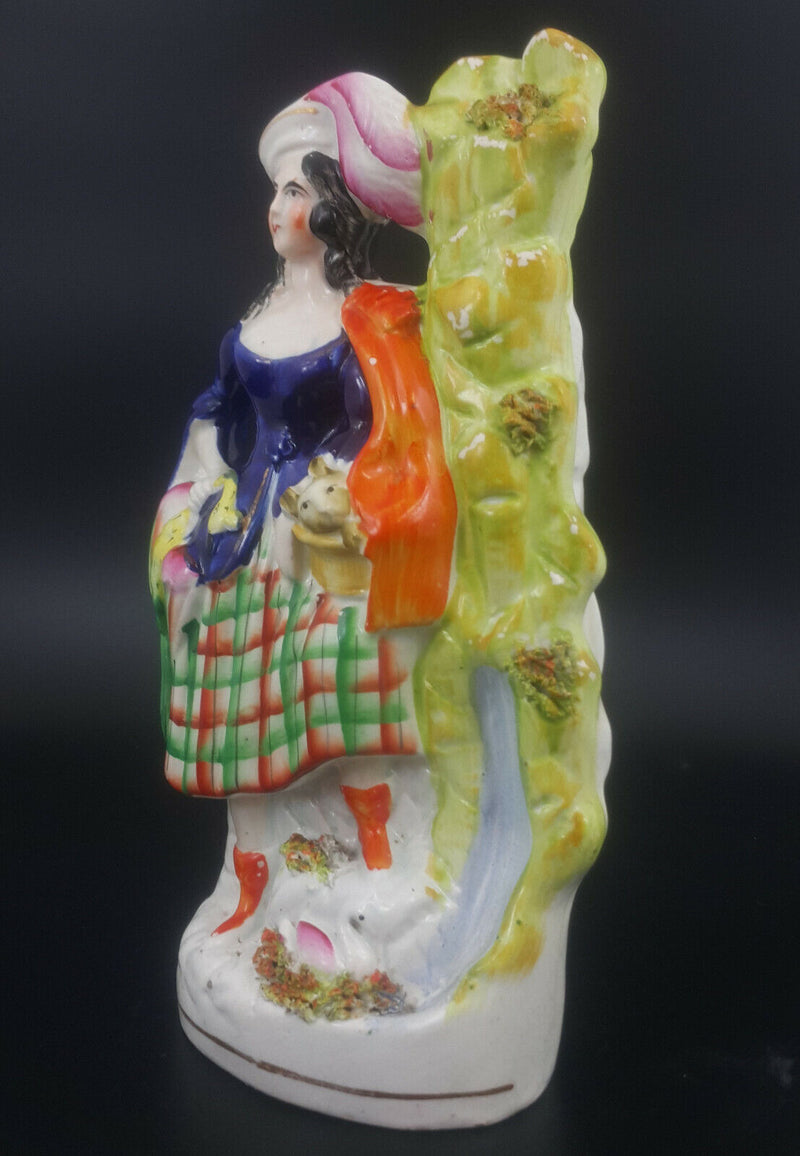 Staffordshire Figurine Lady with Rabbit in Basket