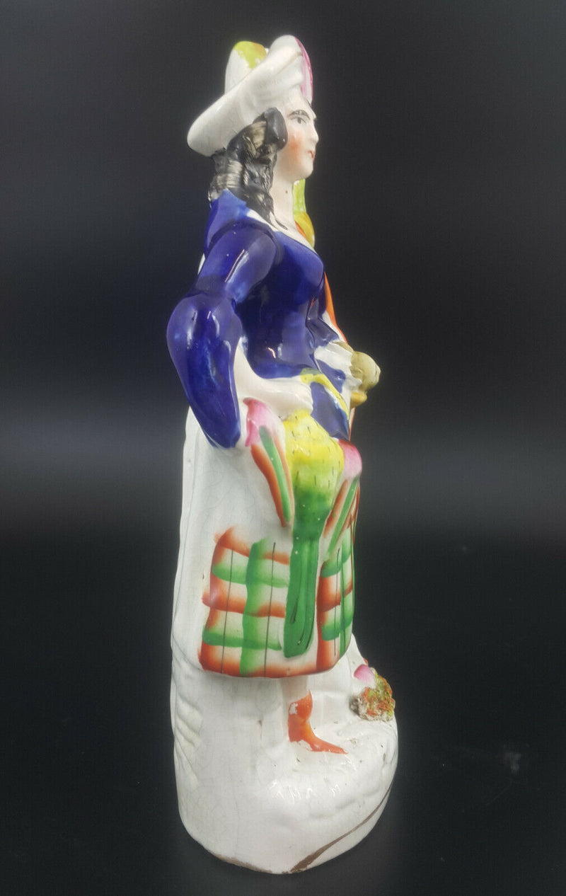 Staffordshire Figurine Lady with Rabbit in Basket