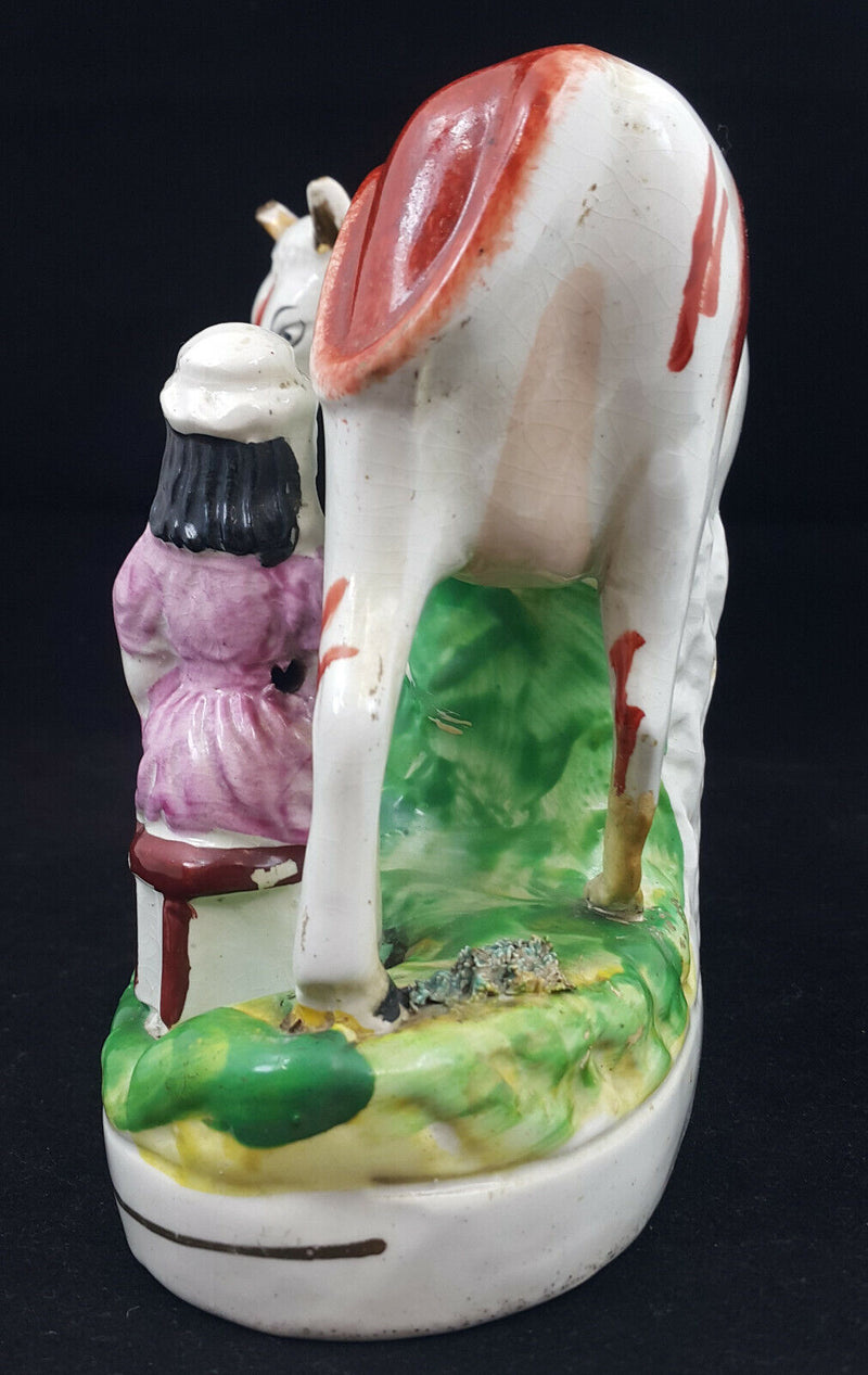 Staffordshire Figurine Lady Milking Cow - Ear Chipped