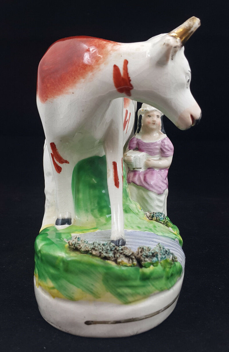 Staffordshire Figurine Lady Milking Cow - Ear Chipped