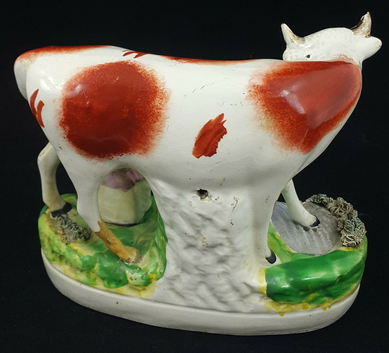 Staffordshire Figurine Lady Milking Cow - Ear Chipped