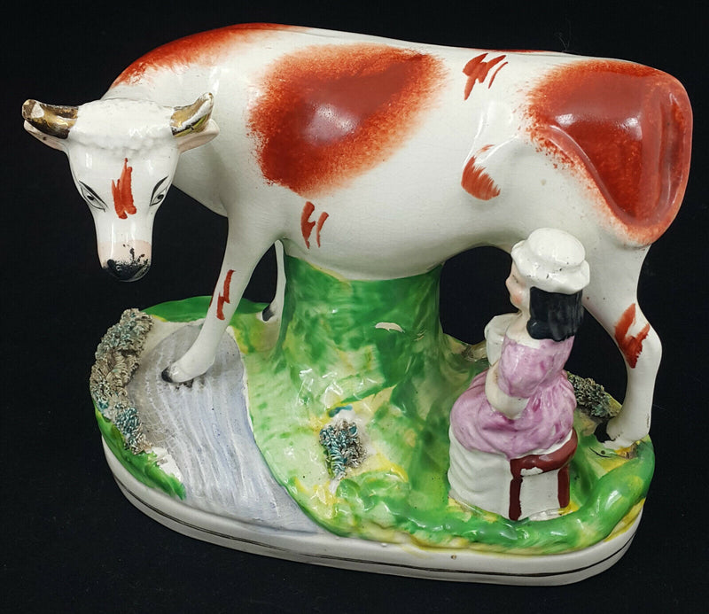 Staffordshire Figurine Lady Milking Cow - Ear Chipped