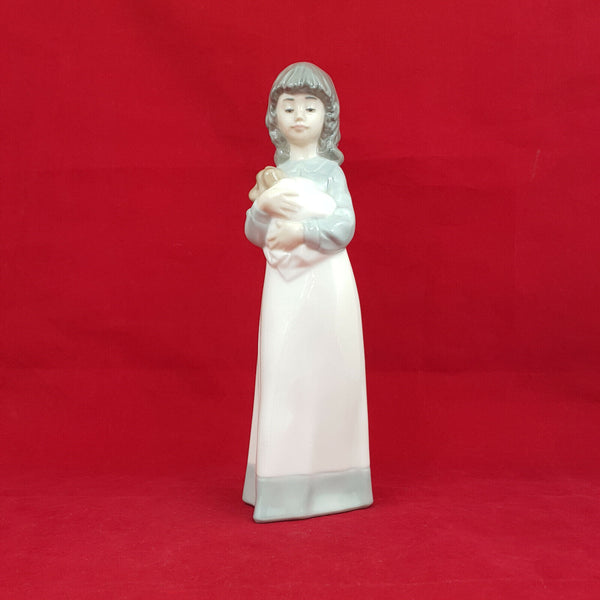 Lladro Nao Figurine - A Young Girl Holding Her Puppy in a Blanket - 0138 L/N