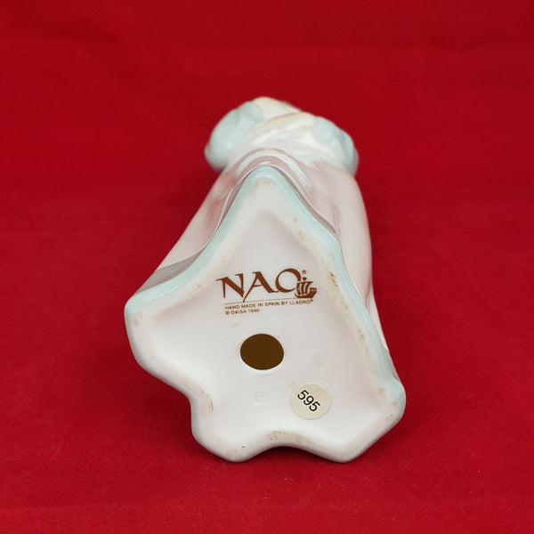 Lladro Nao Figurine - A Young Girl Holding Her Puppy in a Blanket - 0138 L/N