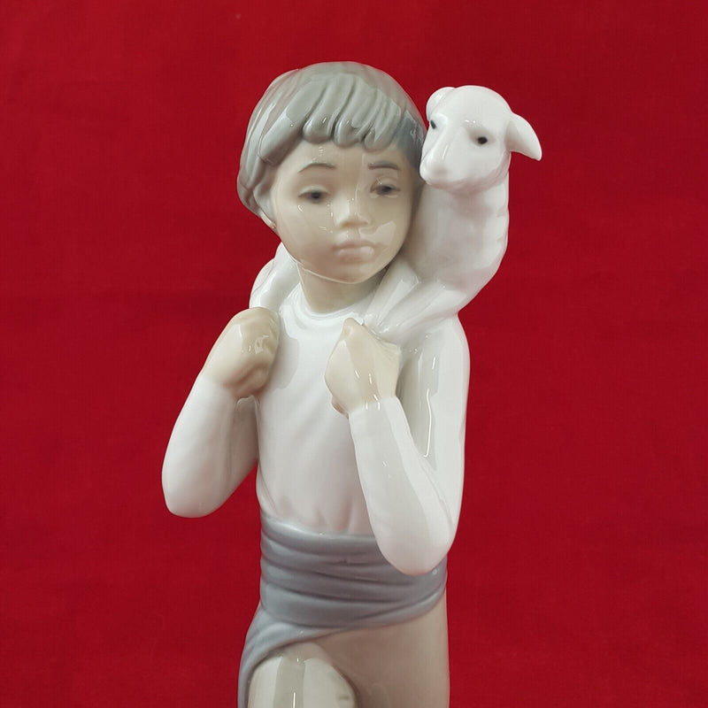 Nao By Lladro Figurine Boy Carring Lamb - 8157 L/N