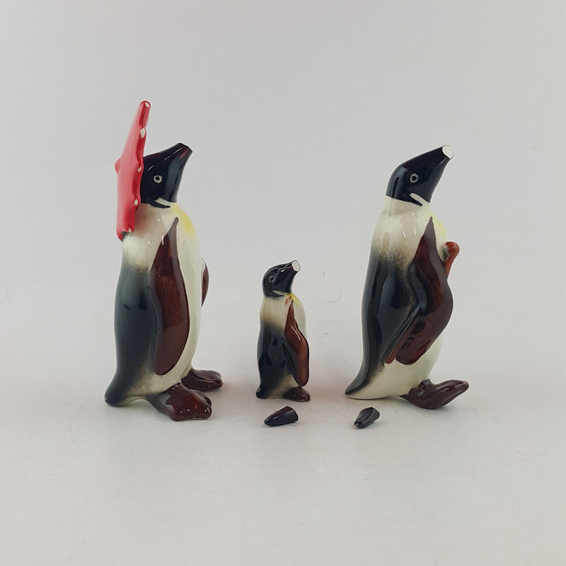 Beswick - Penguin Family (damaged)