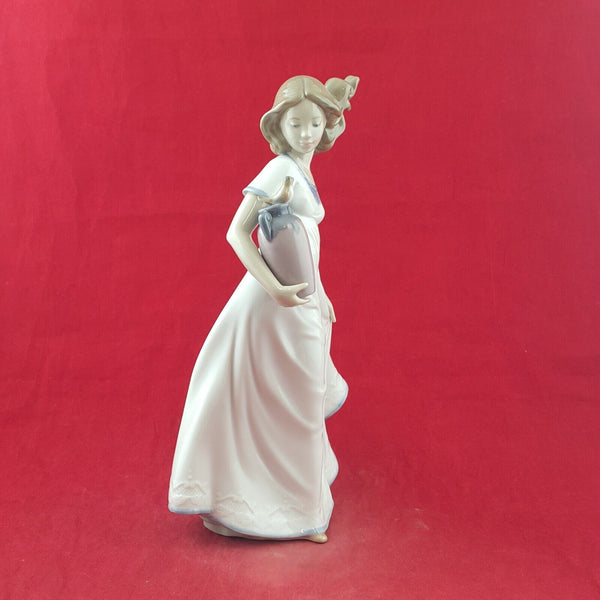 Lladro Nao Figurine 1409 A Joyful New Friend - 8521 L/N