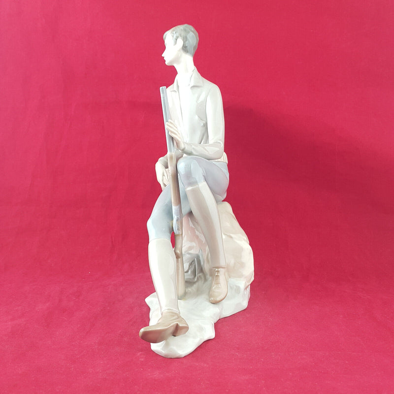 Lladro Nao - Man / Huntsman With A Rifle Resting On A Tree Branch - L/N 2327