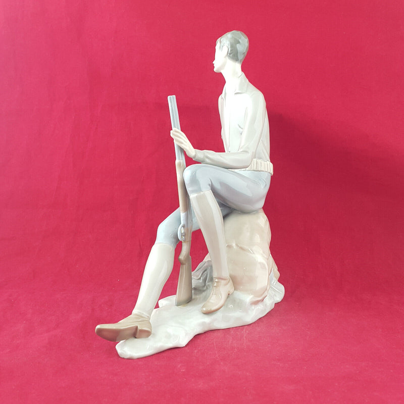 Lladro Nao - Man / Huntsman With A Rifle Resting On A Tree Branch - L/N 2327