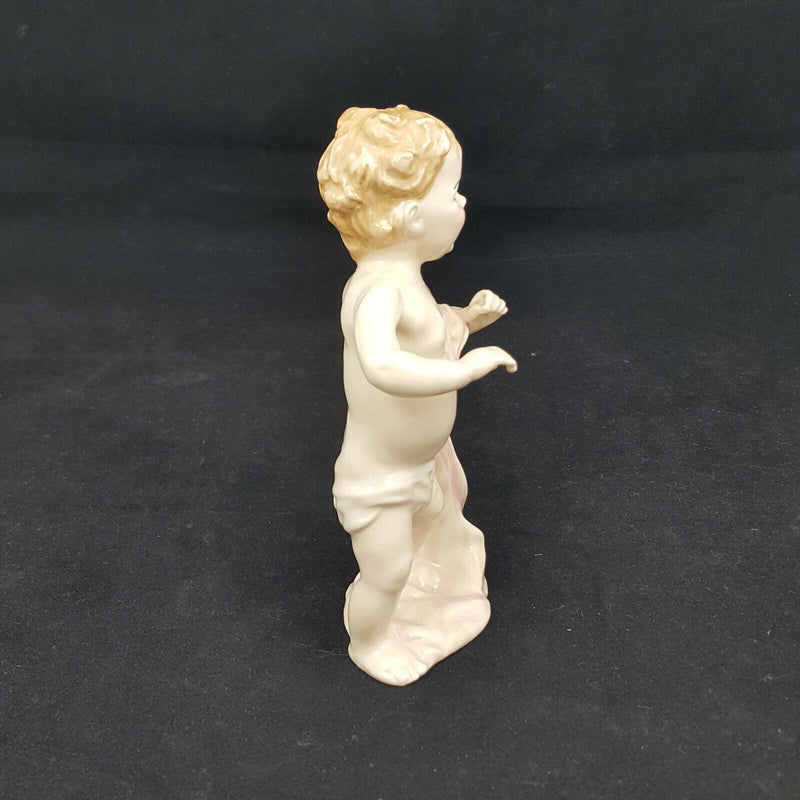 Royal Doulton Miniature Figurine  HN3361- First Steps (damaged - restored neck)