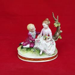 Capodimonte Porcelain Figural Group of Girl & Boy Seated on a Tree Branch