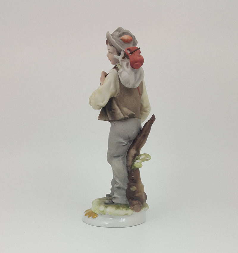 Capodimonte Figurine Boy with Backpack (small chip)