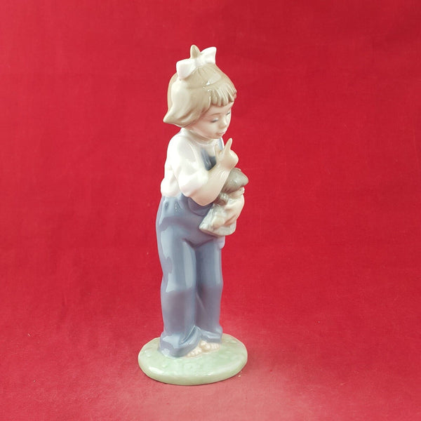 Nao by Lladro Porcelain Figurine 1069 Hush Now Girl - 8883 L/N