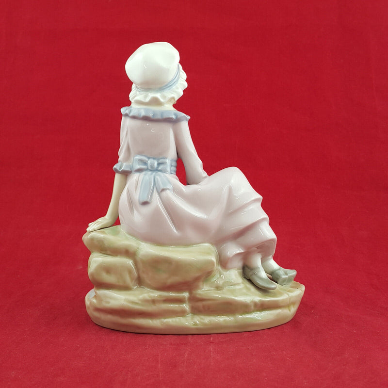 Nao By Lladro - Girl Sitting On The Edge Of Water With Floating Boat - L/N 2035