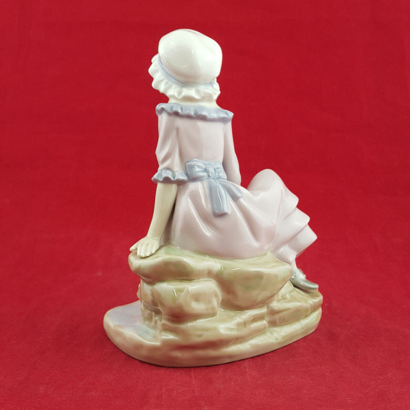 Nao By Lladro - Girl Sitting On The Edge Of Water With Floating Boat - L/N 2035