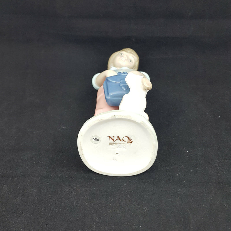 Nao Lladro Boy with Backpack and Dog -very sligh chip on back of neck, restrored