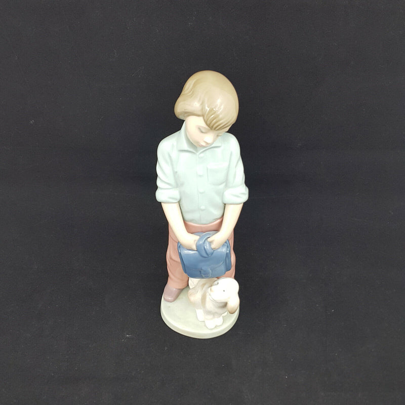 Nao Lladro Boy with Backpack and Dog -very sligh chip on back of neck, restrored