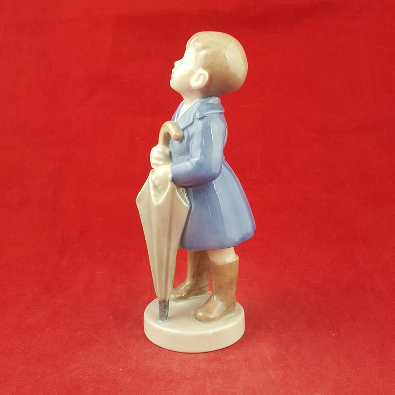 Royal Copenhagen Monthly Figurine 4526 Boy with Umbrella April - 7537 RCH