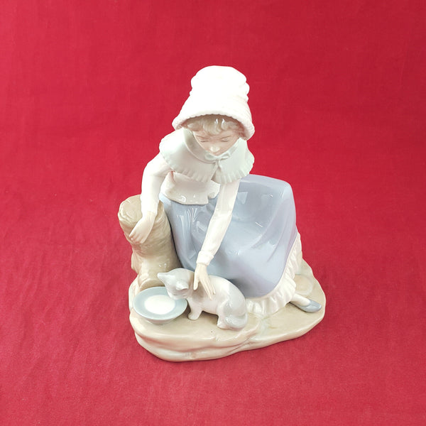 Nao By Lladro - Milk For The Cat 284 | Girl Feeding Milk To Cat - L/N 3472