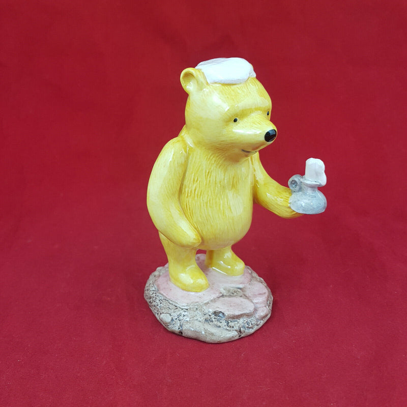 Royal Doultoun Storybook Figurine - Pooh Lights The Candle WP11 (Boxed) - RD 740