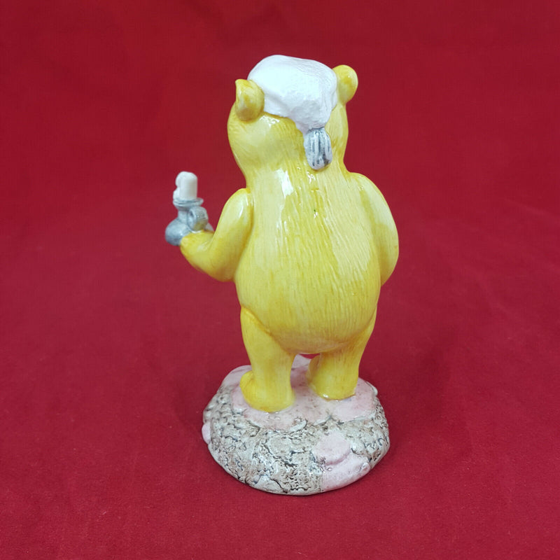 Royal Doultoun Storybook Figurine - Pooh Lights The Candle WP11 (Boxed) - RD 740