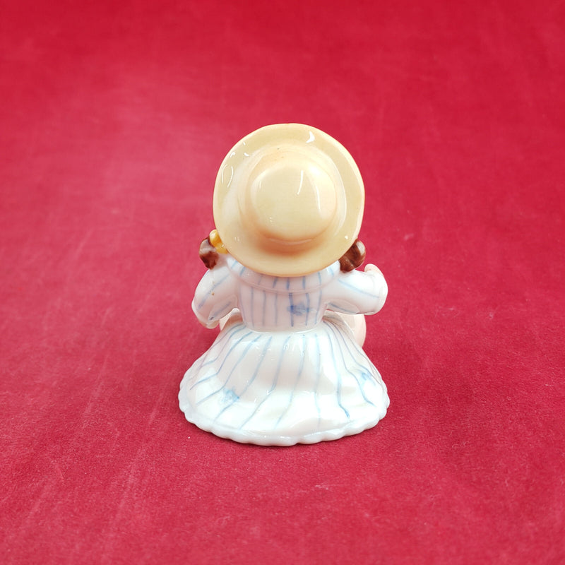 Royal Copenhagen Miniature Child Figure - Seated Doll 141 - RCH 2052