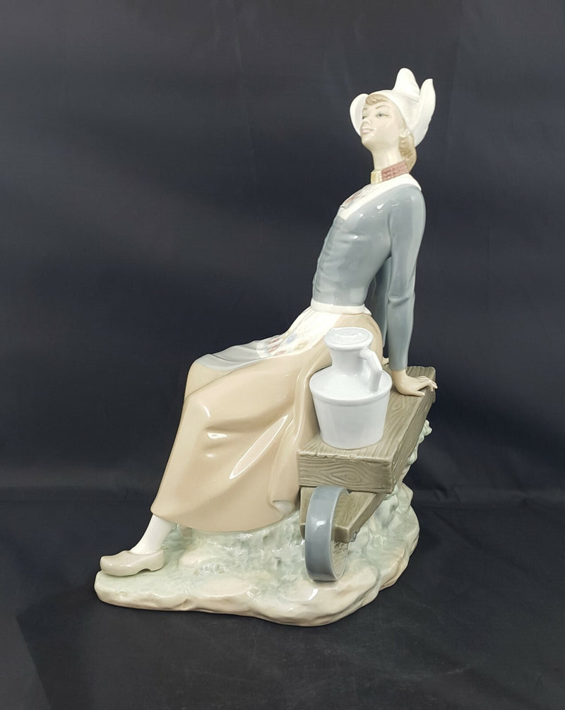Lladro Figurine 4979 Milkmaid with Wheelbarrow - Dutch Woman