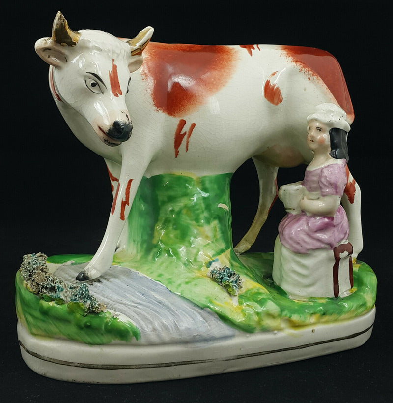 Staffordshire Figurine Lady Milking Cow - Ear Chipped