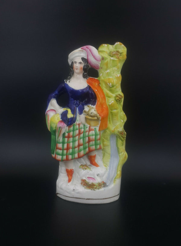 Staffordshire Figurine Lady with Rabbit in Basket