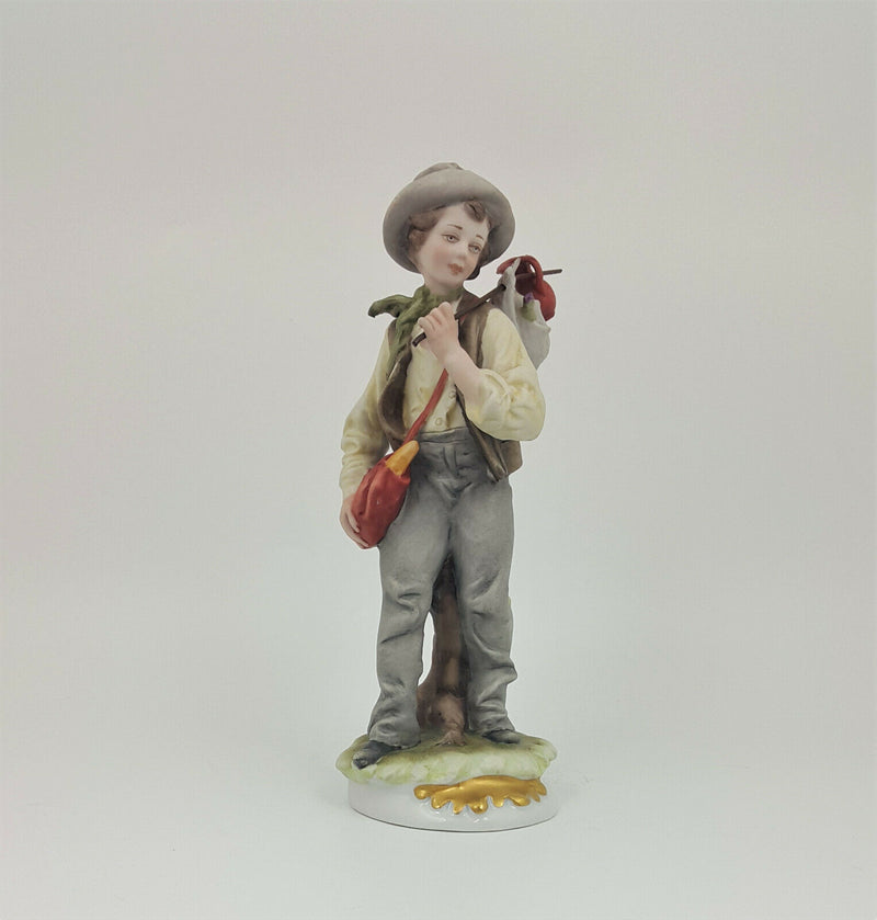 Capodimonte Figurine Boy with Backpack (small chip)