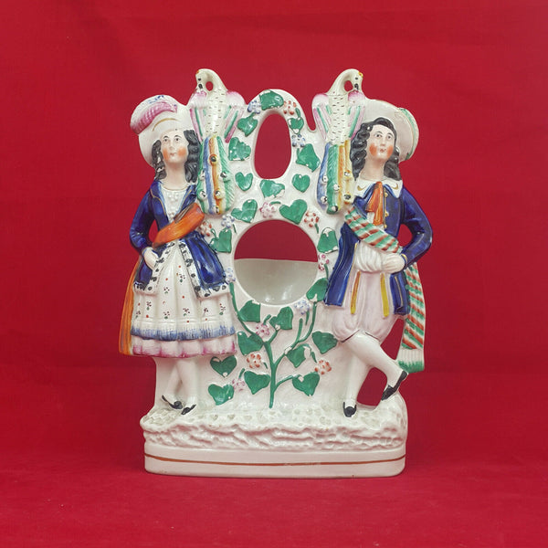 Staffordshire Watch Holder - Couple Standing in Vineyard with Two Peacocks Above