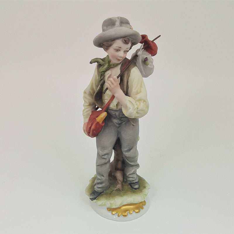 Capodimonte Figurine Boy with Backpack (small chip)