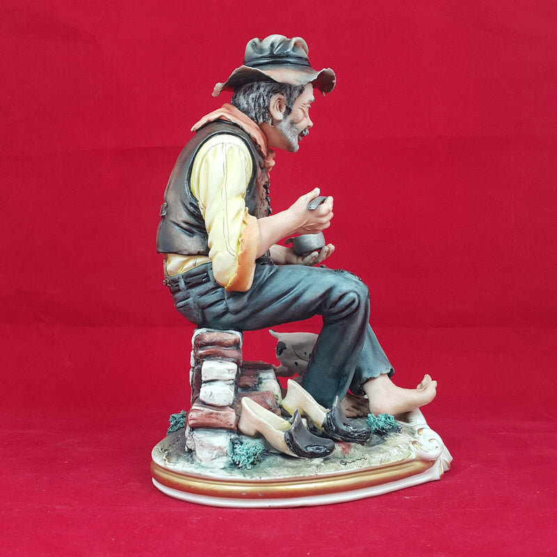 Capodimonte Old Man Figurine with Dog (broken utensil and toe)