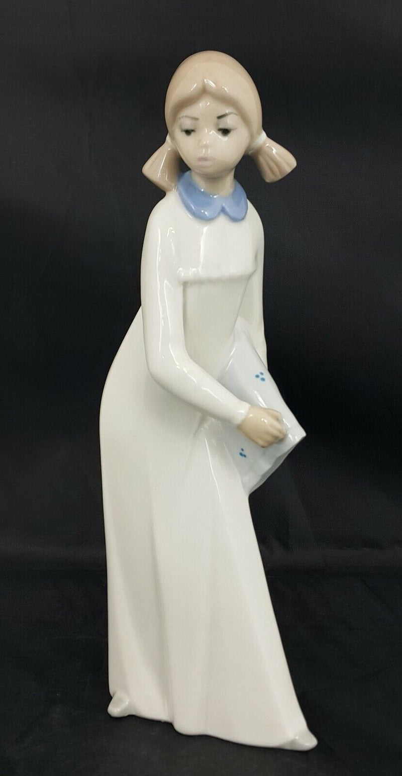 Casades Figurine Girl Holding a Pillow - Some Marks