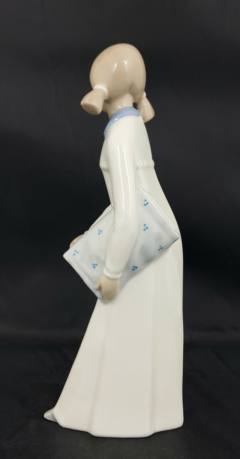 Casades Figurine Girl Holding a Pillow - Some Marks