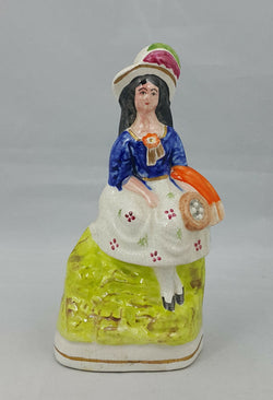 Staffordshire Figurine Lady in a Sitting Pose – Paint Chip