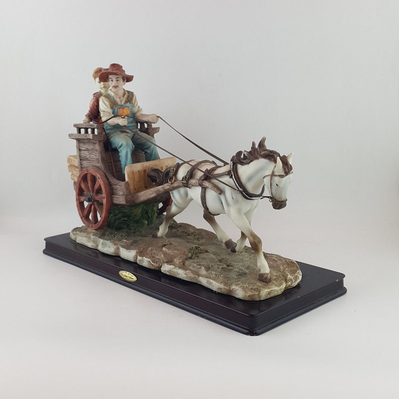 The Juliana Collection - Man With A Boy Riding Horse Cart - NA 1625