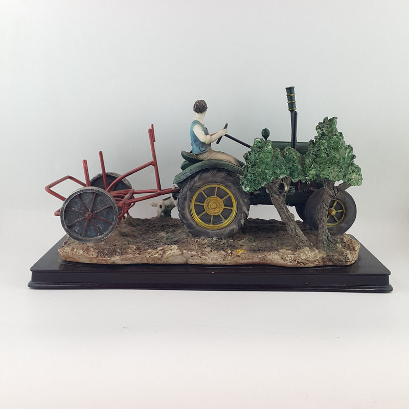 The Juliana Collection - Farmer On A Plough Tractor - NA 1626
