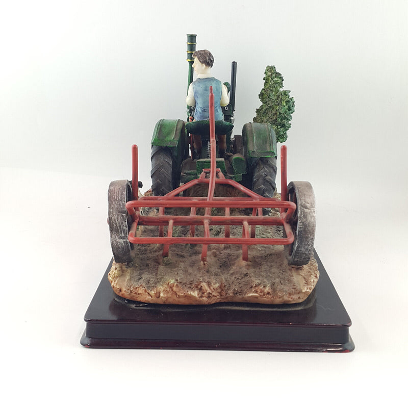 The Juliana Collection - Farmer On A Plough Tractor - NA 1626